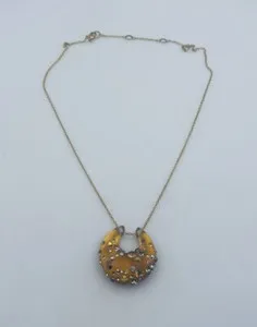 Authentic The Solar Radiance Lucite and Rhinestone Amulet