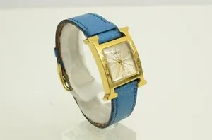 Authentic The Celestial Horizon: Hermes Blue Leather and Gold Sunburst Timepiece