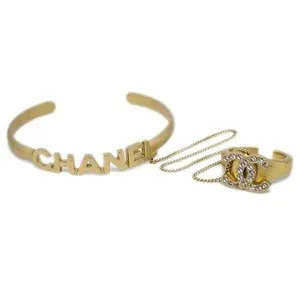 Authentic The Celestial Conjunction: Gold-Plated Crystal Emblem Bangle with Tethered Chain