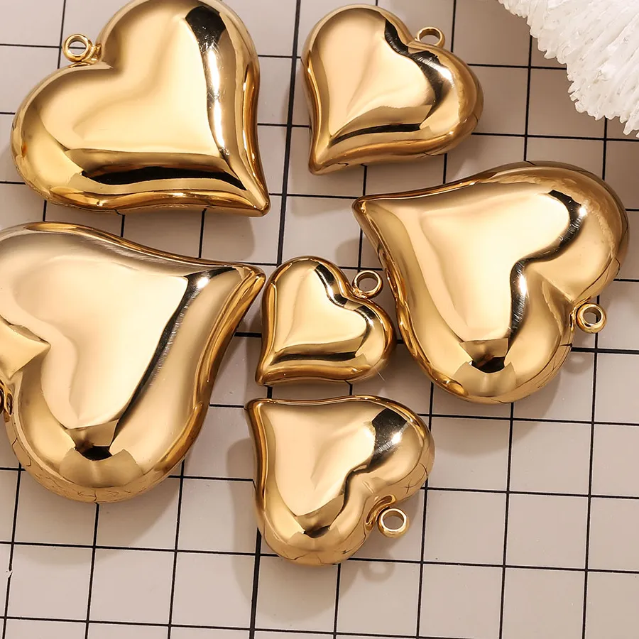 Authentic Heartbeat of Love: Radiant Gold-Infused Heart Charms
