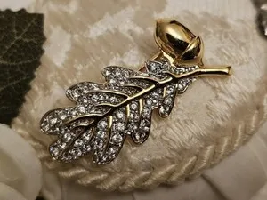 Authentic Enchanted Acorn of Abundance – White Crystal Gold‑Plated Brooch Talisman