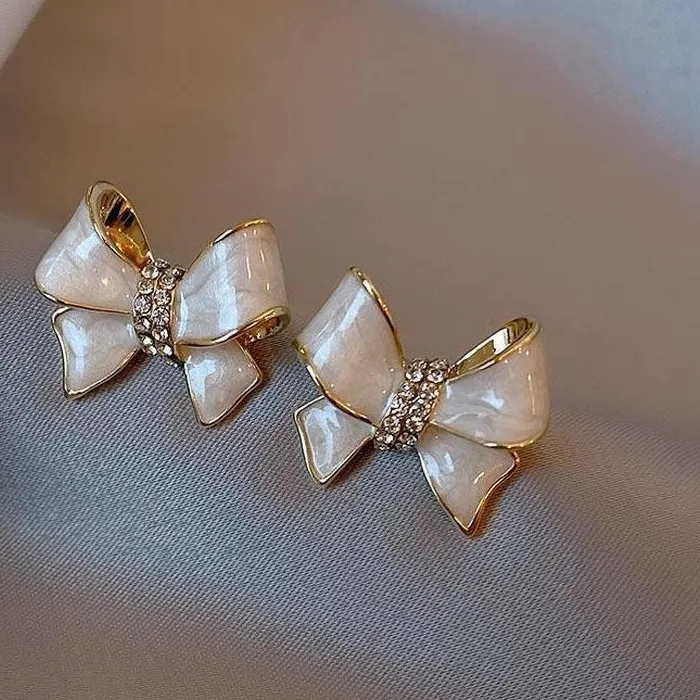 Authentic Luminous Bow of Eternal Grace: Sacred Knot Studs