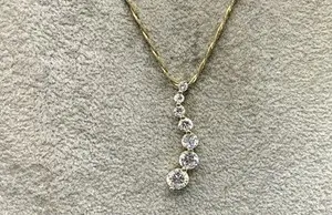 Authentic Radiant Cascade: The Gilded Luminary Pendant