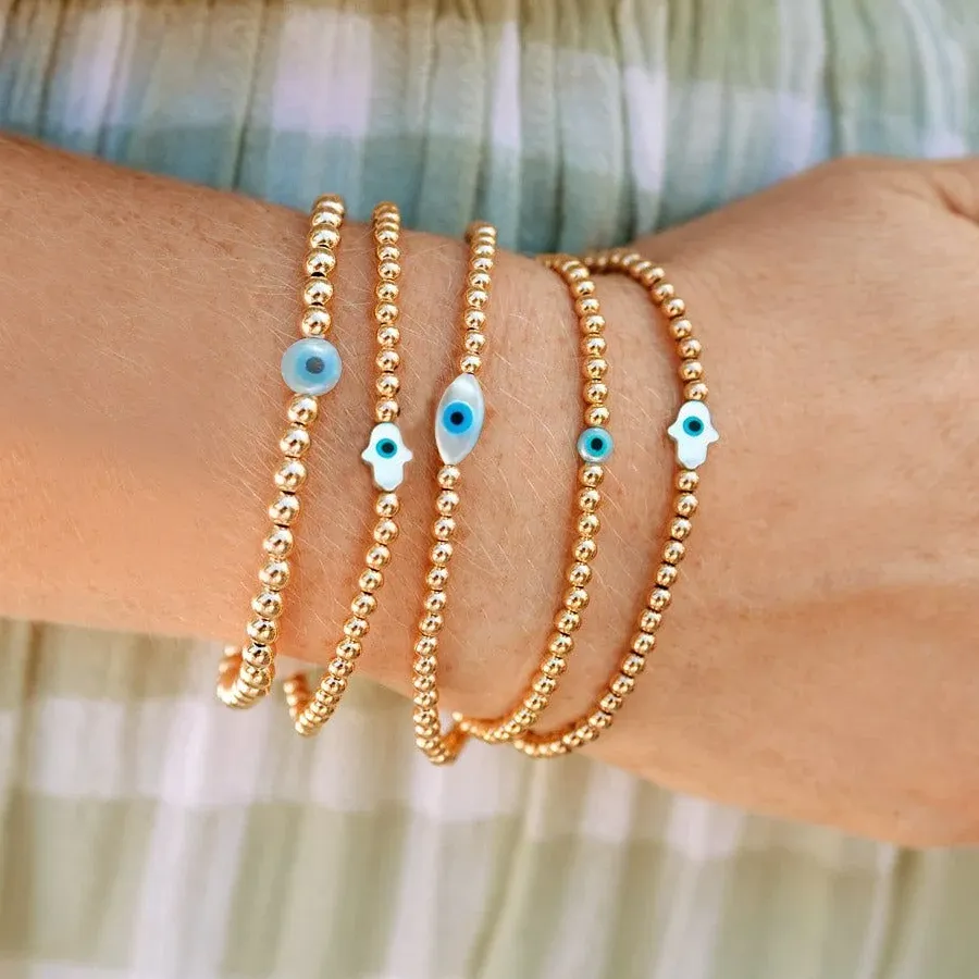 Authentic Radiant Shield: The Gold-Plated Hamsa and Evil Eye Sacred Stretch Bracelet