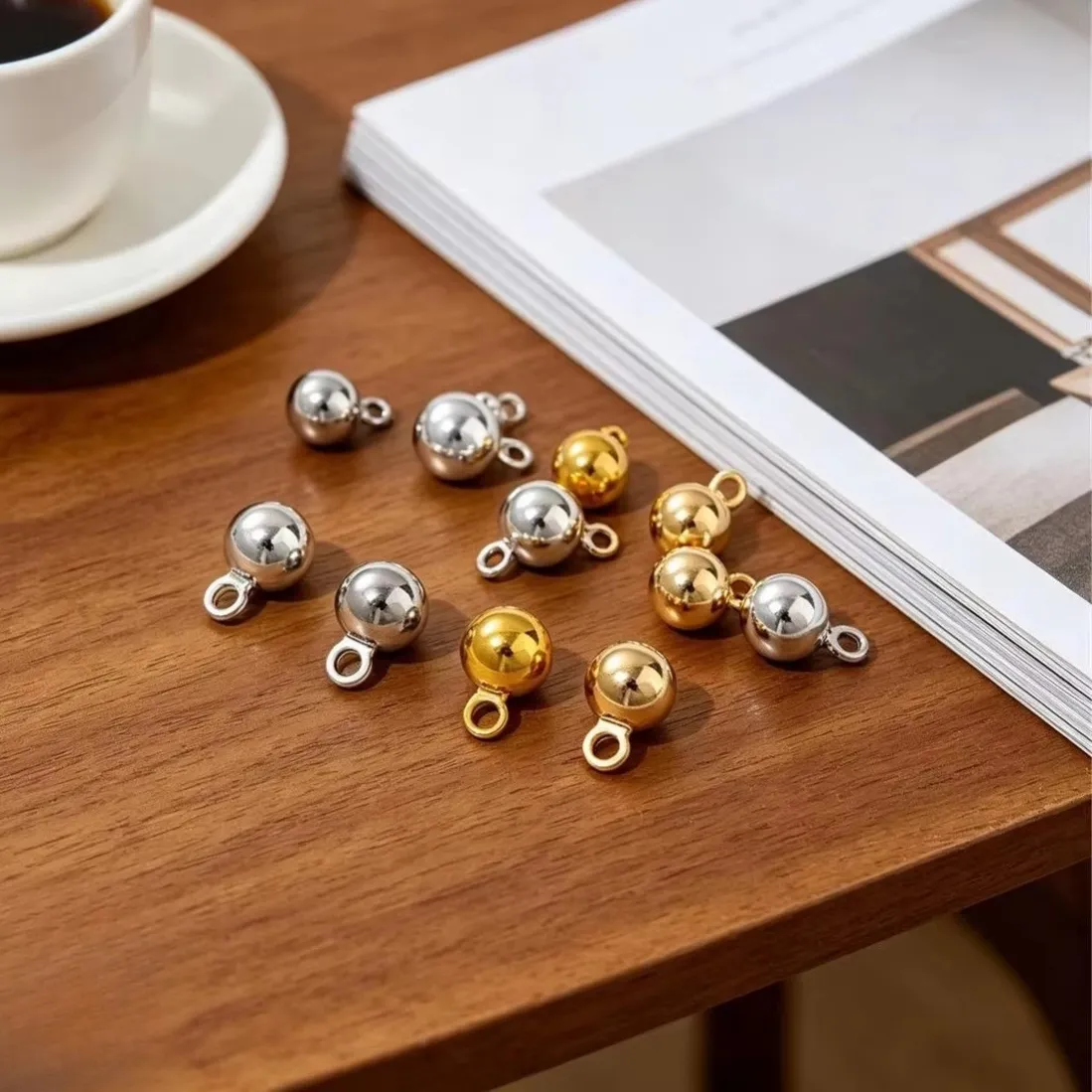 Authentic Harmony of the Spheres: 18K Gold & Silver Bean Charms for Balance and Serenity