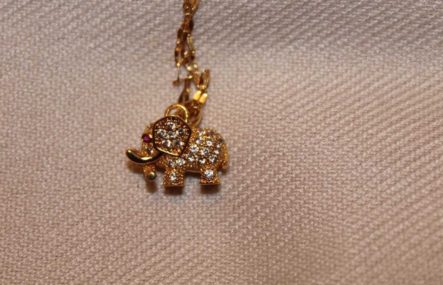 Authentic Celestial Ivory Guardian: Gold‑Plated Elephant Amulet