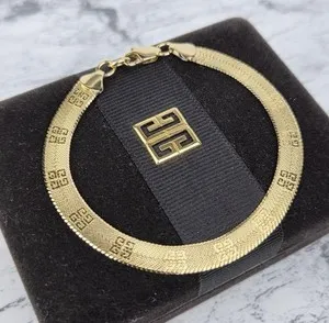 Authentic The Golden Continuum Vintage Givenchy 4G Herringbone Talisman Bracelet