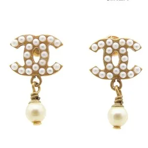 Authentic Radiant Pearl Resonance: The Gilded CC Swing Earrings