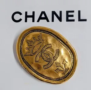 Authentic Enchanted Crown of the Sacred Chanel – Gold‑Plated Oval Brooch
