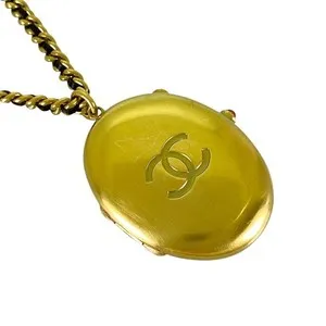 Authentic Coco's Enchanted Mark: Gold-Plated Leather Amulet of Eternal Elegance