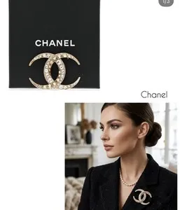 Authentic Celestial Intertwining: The Gilded CC Radiance Brooch