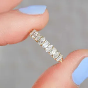 Authentic The Celestial Half-Eternity Band: A Symphony of Pear and Baguette Light