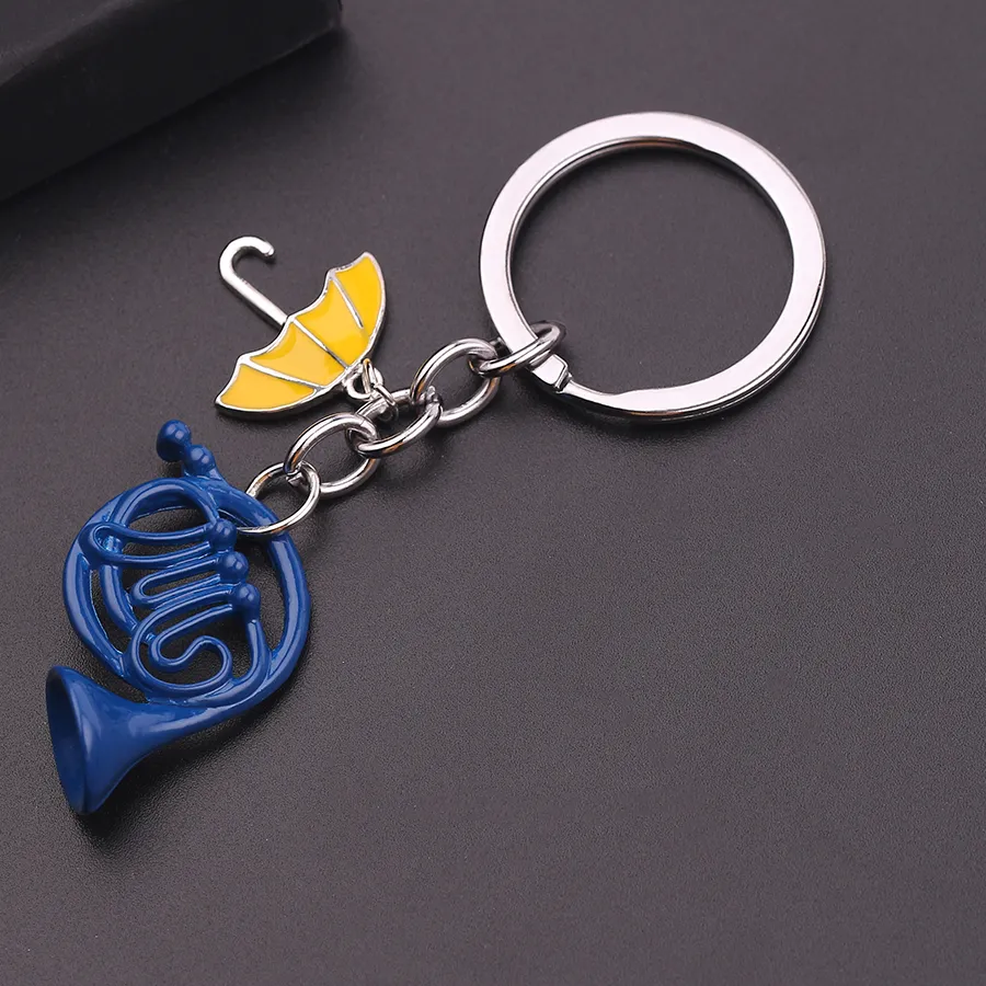 Authentic Twin Charms Of Destiny The Yellow Umbrella And Blue French Horn Keychain Talisman