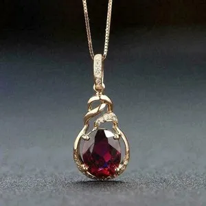 Authentic Radiant Crimson Veil: 2‑Carat Oval Garnet Pendant, Gold‑Plated Grace
