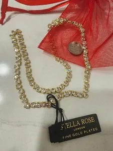 Authentic Stella Rose Valentine: Crystal Heart Amulet in Gold