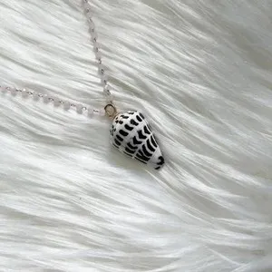 Authentic Radiant Shell of the Sacred Tide: A Gold-Plated Hebrew Cone Talisman