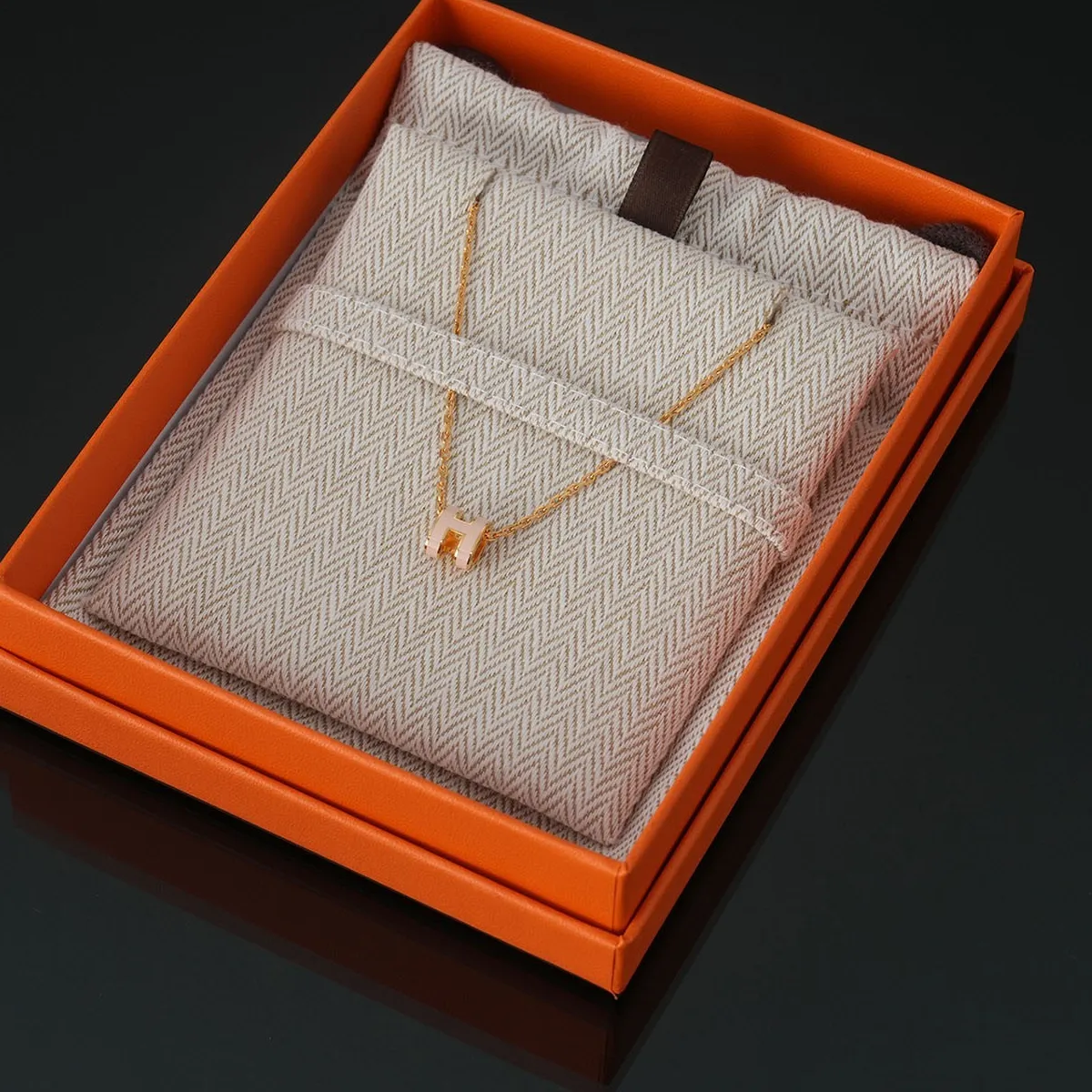 Authentic Eglantine Rose Radiant Heart Talisman – Hermès Mini Pop H Gold-Plated Amulet