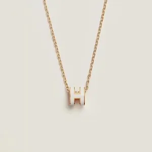 Authentic Hermes Mini Pop H Necklace: White Lacquered Gold Plated Symbol of Elegance and Protection