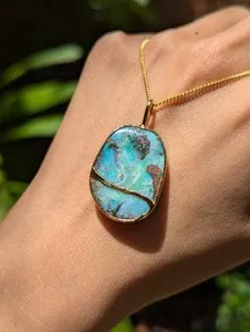 Authentic Celestial Fire: The Boulder Opal Sun-Catcher Amulet