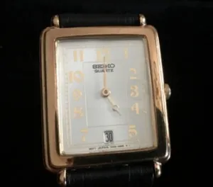 Authentic The Golden Epoch: Vintage Seiko Quartz Chronometer with Sun-Gilded Case and Leather Binding