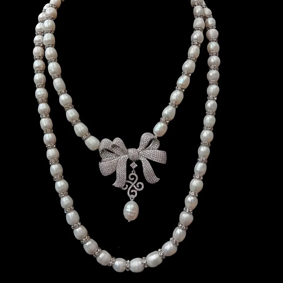 Authentic The Luminescent Ribbon of Grace Freshwater Pearl and Crystal Talisman