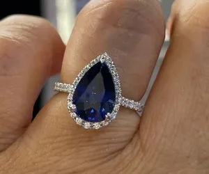 Authentic Ethereal Dreamscape: 2.10Ctw Pear Cut Lab Created Sapphire Halo Ring