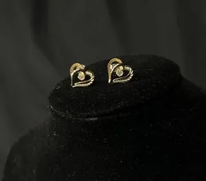 Authentic Radiant Heart Illusion Studs: A Golden Vessel of Eternal Affection