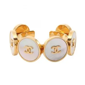 Authentic The Gilded Shell of Coco: An Iconic Bangle of Timeless Elegance