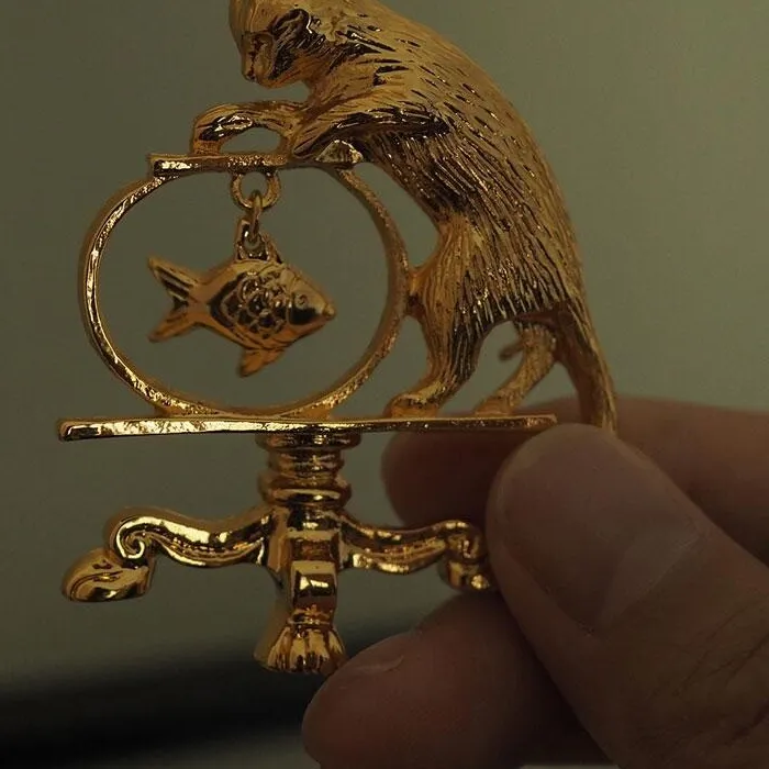 Authentic The Angling Feline: A Vintage Gold-Plated Talisman of Patient Fortune