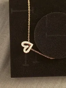 Authentic Unlock the Heart's Essence with Radiant Rose Gold-Plated Open Heart Elegance