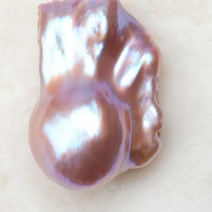 Authentic The Iridescent Tides: Natural Baroque Pearl of the Deep Waters