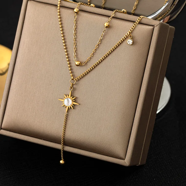 Authentic Luminous Tide Dual-Layer Shell and Zircon Amulet