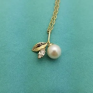 Authentic The Enchanted Pearl's Embrace A Floral Pendant Of Sacred Protection