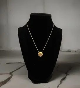 Authentic Cosmic Harmony in Gold: Givenchy's Celestial Cutout Pendant
