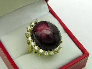 Authentic Starlit Ruby: 20x16.3mm Lab-Grown Purple-Red Star Gem in 925 Gold