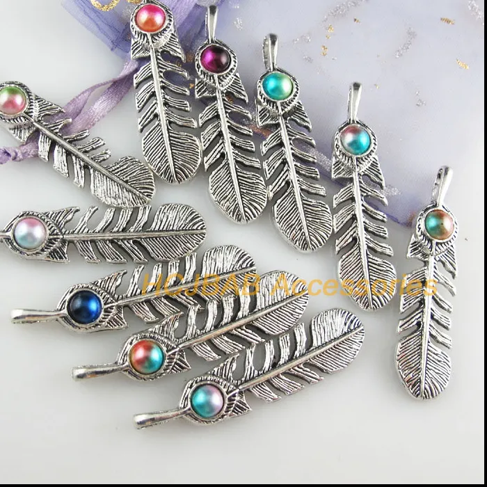 Authentic Whispers of the Wind: Tibetan Silver and Acrylic Feather Talismans