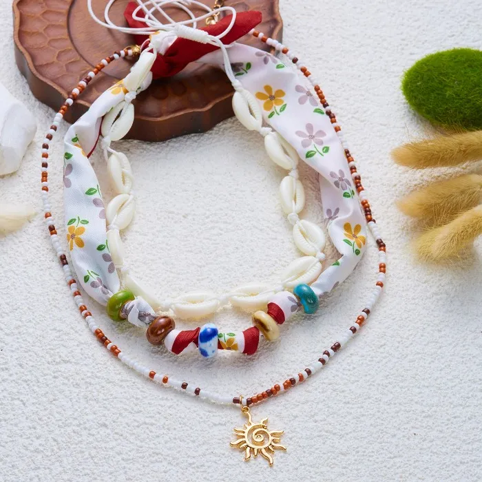 Authentic Solar Tides Cowrie Shell and Sun Layered Talisman