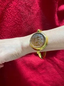 Authentic Golden Embrace of 31 Rue Cambon: Vintage Chanel Bangle