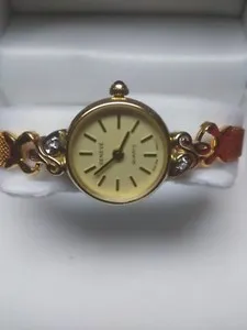 Authentic The Celestial Chronos: 10K Solid Gold Vessel with Twin Diamond Sentinels