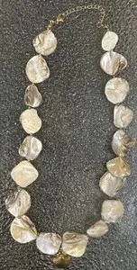 Authentic Tides of Tranquility: Golden Armor of the Ocean's Heart