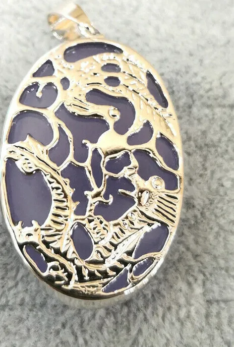 Authentic Embody the Celestial Harmony of East and West with the Dragon Phoenix Sun Pendant