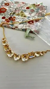 Authentic Celestial Radiance: The Les Néréides Paris White 9 Stones Gold-Plated Talisman