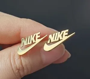 Authentic Golden Momentum: The Swoosh and Butterfly Amulet Earrings