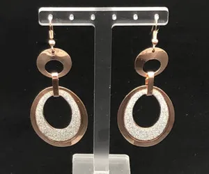 Authentic Oval Celestial Harmony: Dazzling Gold Plated Earrings for Spiritual Balance