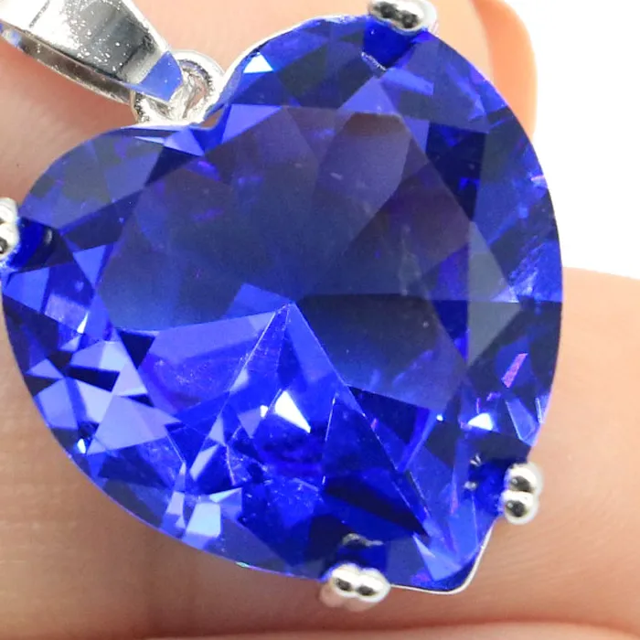 Authentic Heart of the Cosmos: Ruby-Tanzanite Heart of Valor Pendant