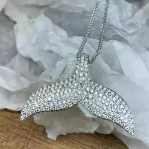 Authentic Tides of Serenity: Whale Tail Pendant of Endless Protection