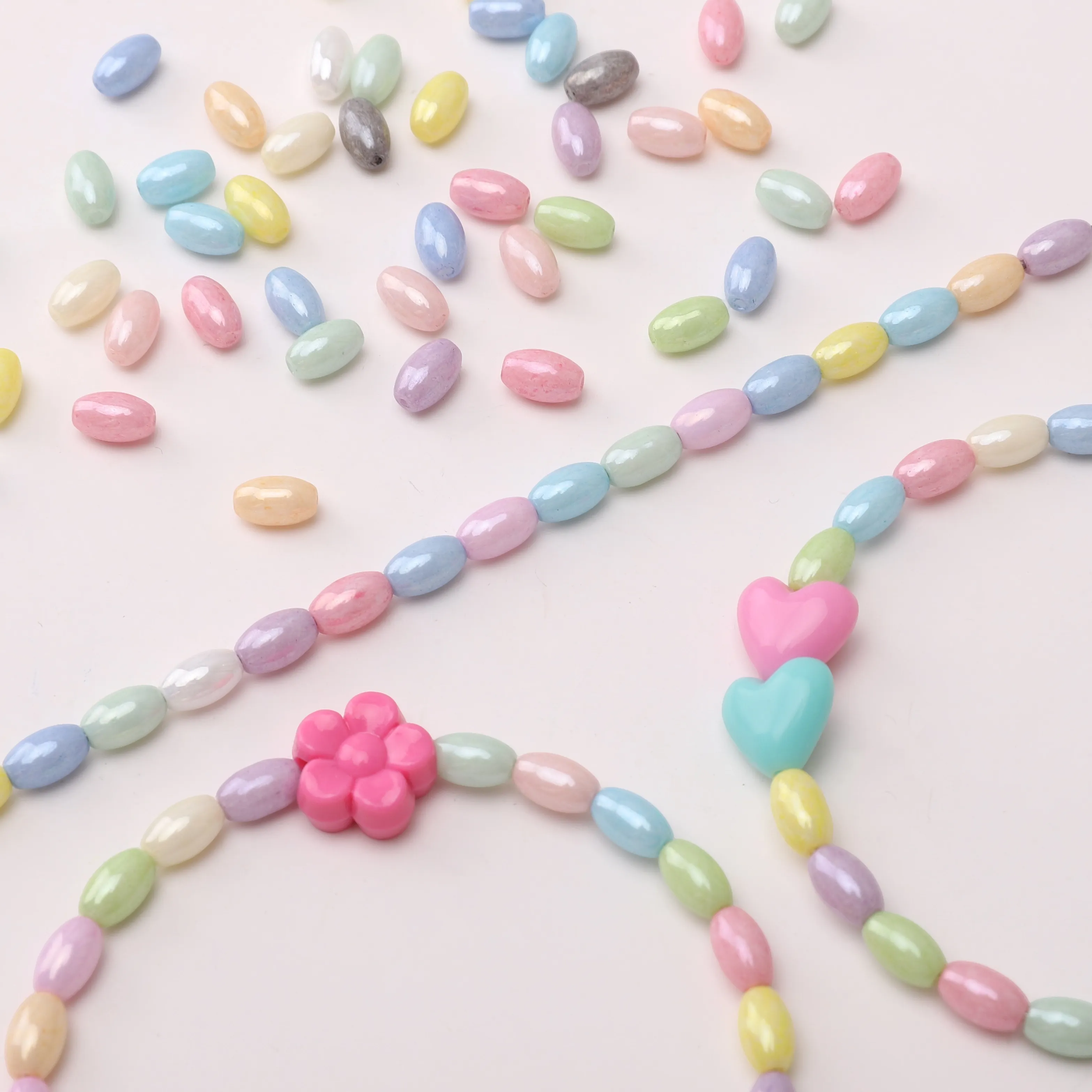 Authentic Celestial Harmony: Oval Glass Beads of Gentle Cream