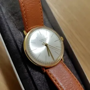 Authentic Celestial Timekeeper: Gold‑Veiled Max Bill Watch with Silver Moon Dial