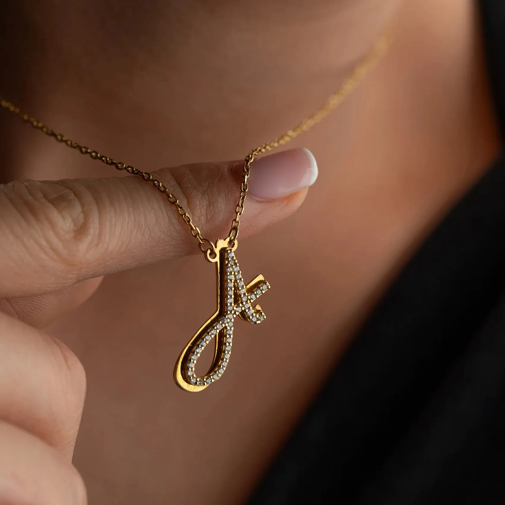 Authentic Whispers of the Heart: The Golden Initial Amulet