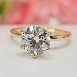 Authentic Radiant Luminescence: The 5 Carat White Treated Diamond Ring in Luminous Yellow Gold